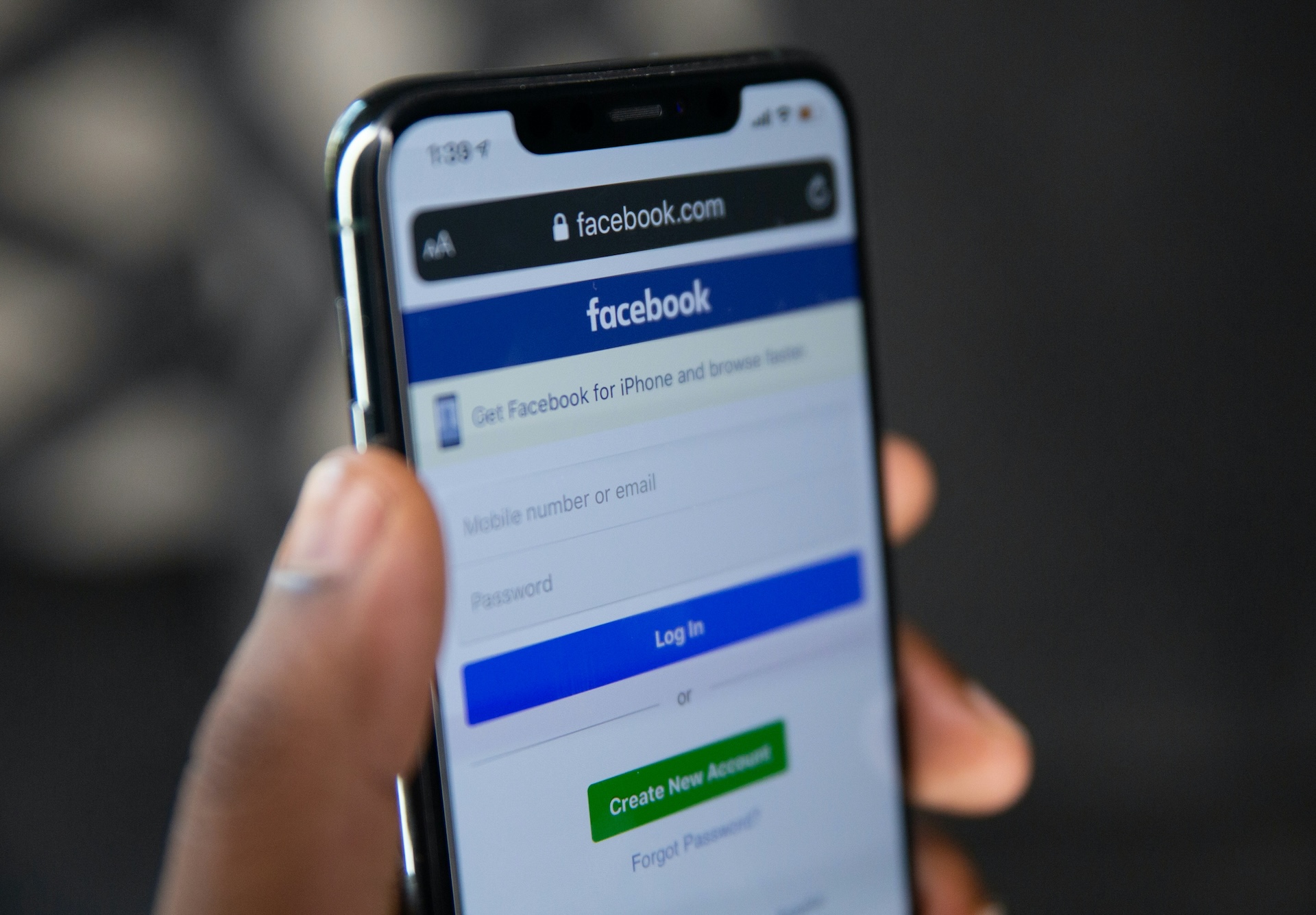 The Facebook login page shown on a smartphone