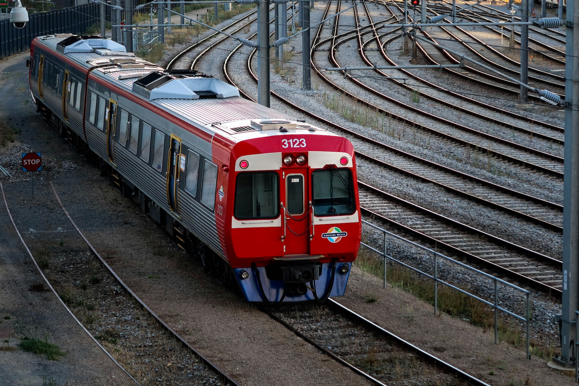 An Australian red train moving on the tracks
