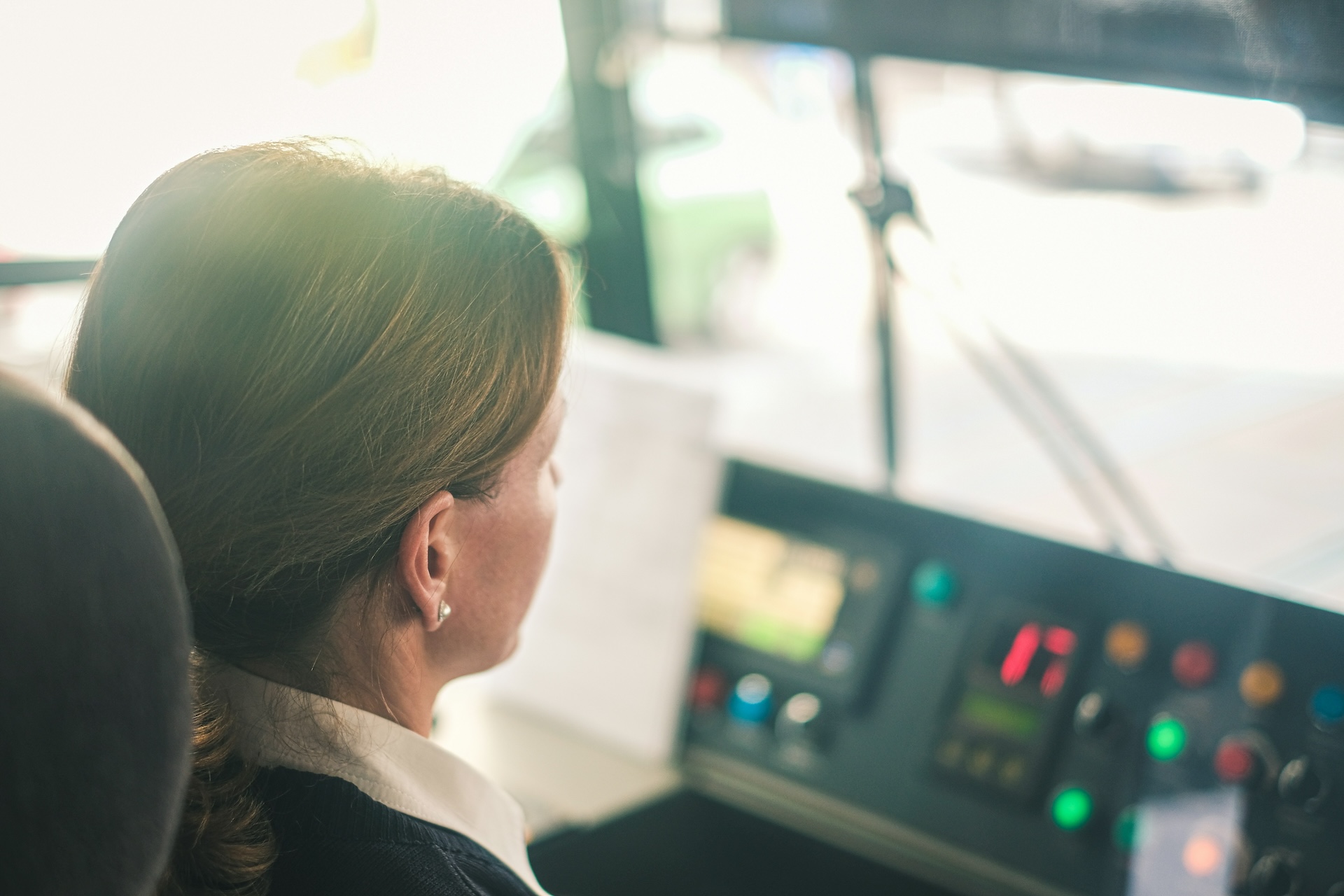 A young woman as a public transport driver