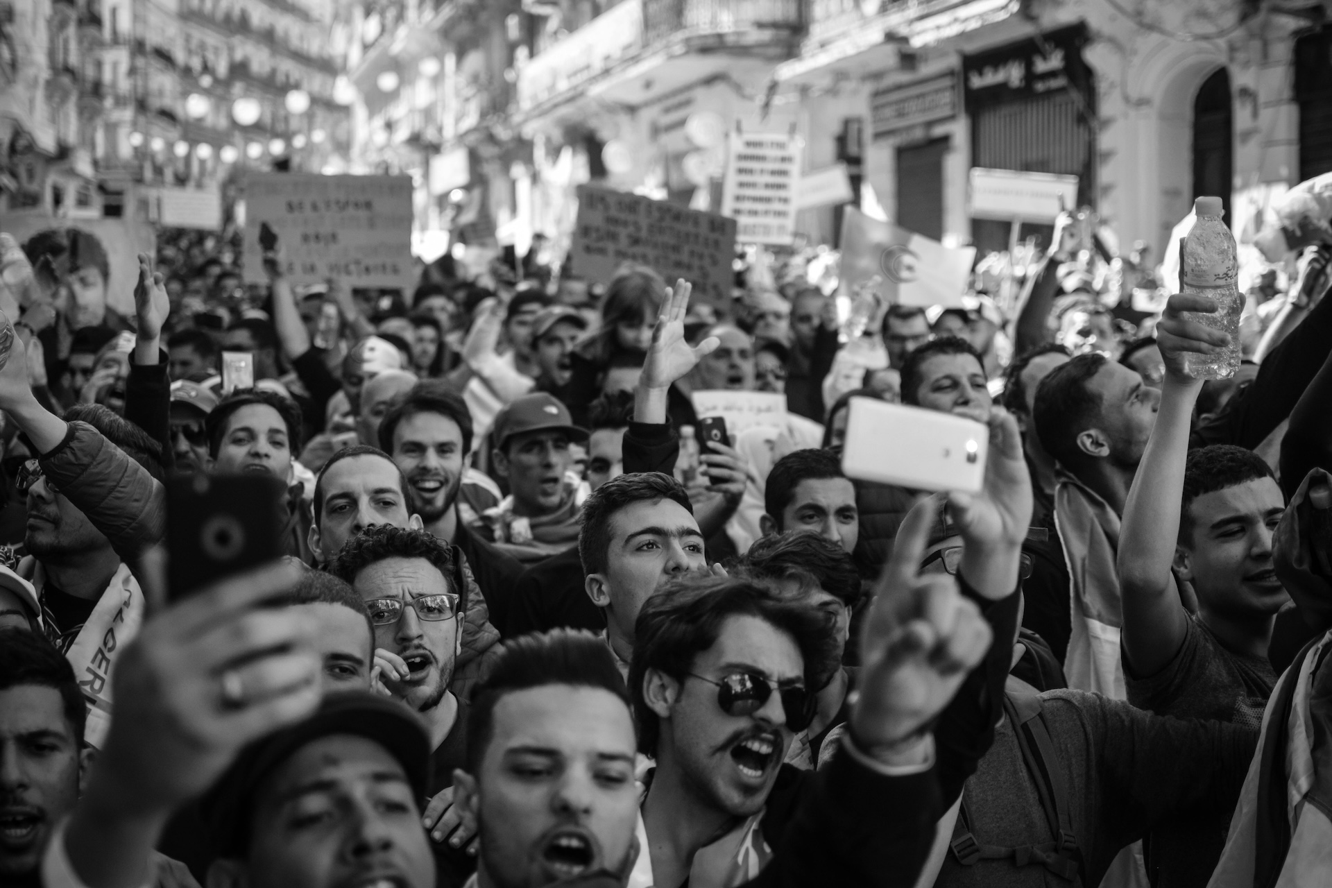 Black and white photo of a crowd of people protesting